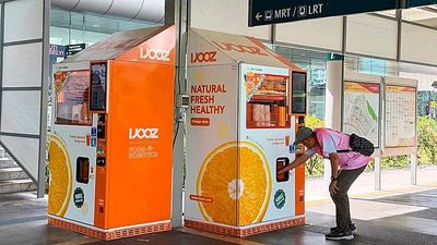 French teen charged in Singapore over vending machine straw-licking viral video