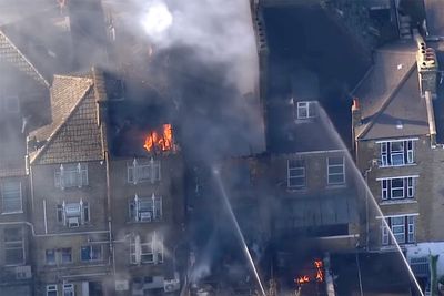 Firefighters tackle huge blaze at property near synagogue in north London