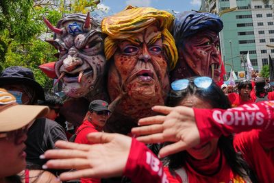 What is May Day and why are protests taking place around the world?