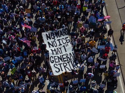 Thousands in US join ‘no school, no work, no shopping’ May Day protest and economic blackout