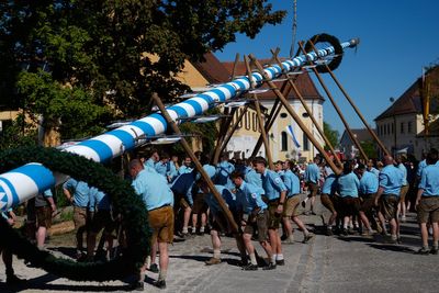 Beer, music and shouts of 'Hau-Ruck' as a Bavarian village raises its new maypole