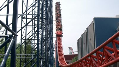 ‘I would have an absolute panic attack’: Riders forced to climb down Six Flags’ tallest roller coaster after it suddenly stops mid-loop