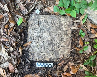 Ancient Roman gravestone found in New Orleans back yard returned to Italy