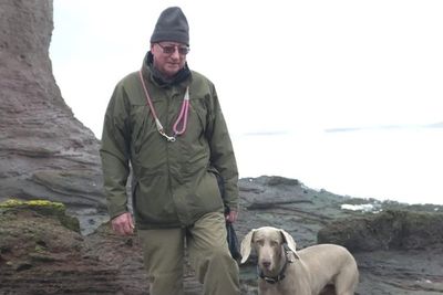 ‘Heroic’ coastguards rescue dog from ‘crashing’ waves after it slipped and fell into the sea