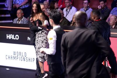 Spectator ejected in disrupted start to World Championship final