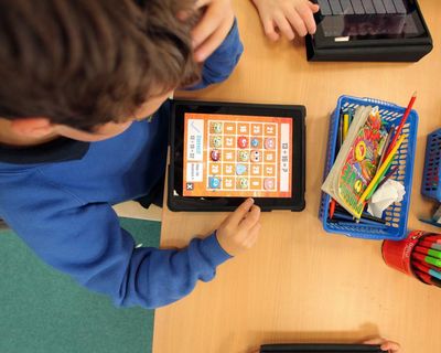 Why are so many schools making pupils learn on screens?