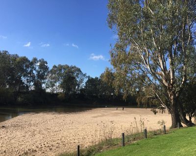 Baby found dead at Wagga beach homeless encampment as mother and another infant taken to hospital