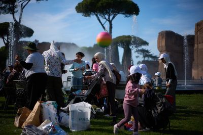 Families evacuated from Gaza enjoy a day to decompress at Rome's ancient baths