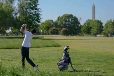 Judge in dispute over Washington golf course tells Trump officials not to cut trees without notice