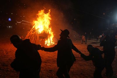 Jewish holiday Lag BaOmer lights up Israel with bonfires and song, in photos