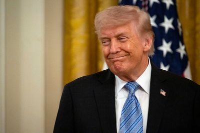 Trump jokes about staying in office beyond two terms at business summit