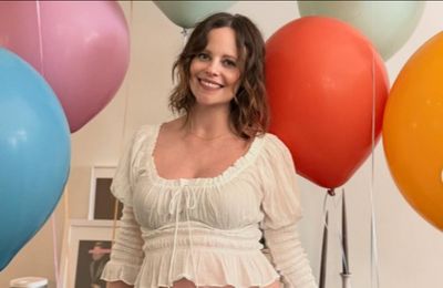 'Surprise!' Sarah Ramos pregnant with first child with husband Matt Spicer