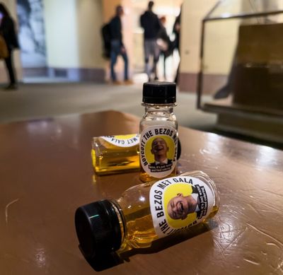 Activists Protest Jeff Bezos at 2026 Met Gala with Symbolic 'Urine' Bottles