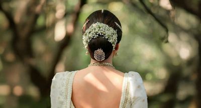 “Viral Moment: Tiny Caterpillar Spotted in Bengali Bride’s Floral Hairstyle”