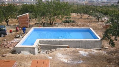 Man was digging a hole for a swimming pool and hit something that wasn’t dirt. Then he found $800,000 staring back at him