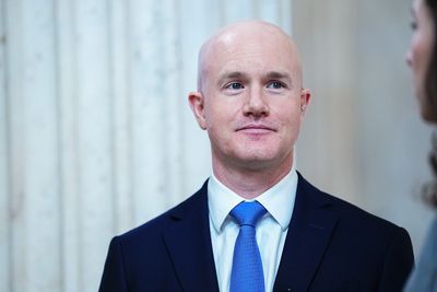 Coinbase didn't just lay off 14% of its staff due to AI. It replaced managers with ‘player-coaches’ and turned its org chart upside down