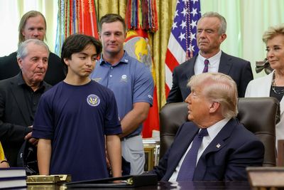 Trump asks child if he thinks he could beat him in a fight after rant about transgender weightlifter