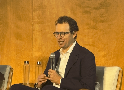Dario Amodei spent last year warning of an AI white-collar bloodbath. Now he's changing the narrative