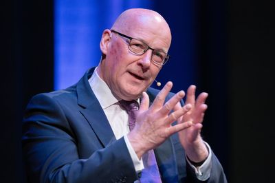 SNP ‘within touching distance’ of Holyrood majority, John Swinney says