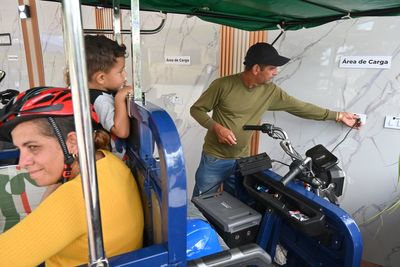 A solar-powered charging station in central Cuba brings life to a darkened island