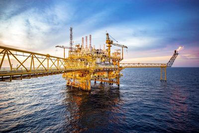 Oil prices drop below 100 dollars a barrel on renewed hopes over peace deal