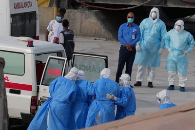 The Latest: 3 passengers from virus-hit cruise ship evacuated to the Netherlands