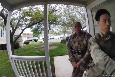 Moment Air Force officers storm ‘wrong house’ and hold child at gunpoint prompting investigation