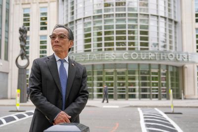 He's accused of running a Chinese spy outpost. His lawyer says it was a place to play ping-pong