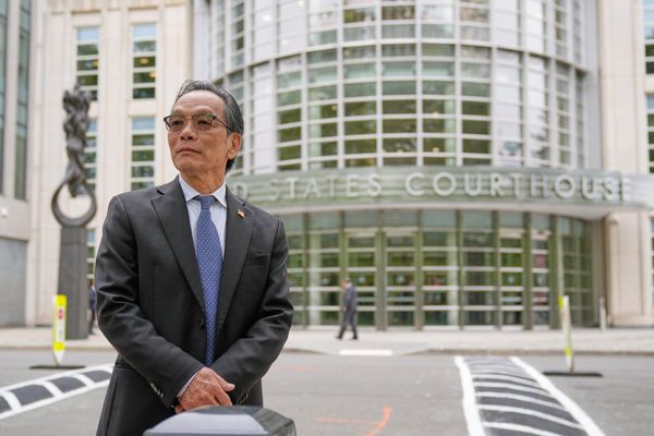 He's accused of running a Chinese spy outpost. His lawyer says it was a place to play ping-pong