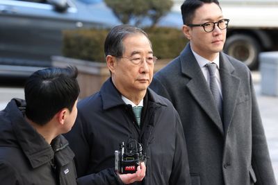 South Korean court reduces prison sentence for ex-prime minister in martial law case