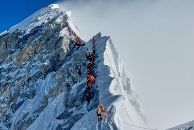 Mount Everest season opens despite a huge unstable ice block and high travel costs