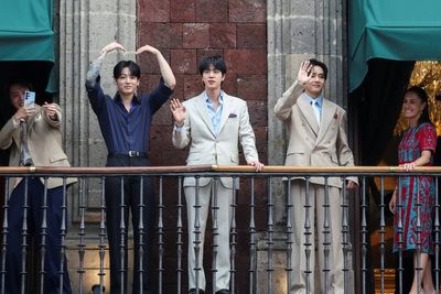 Tears and screams as 50,000 BTS fans flood city square for glimpse of K-pop band in Mexico