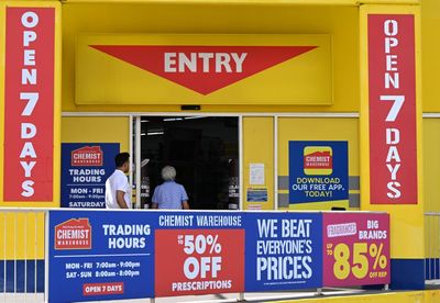 Neon signs, tiny aisles and the ambience of a panic attack. Britain, are you ready for the Chemist Warehouse experience?