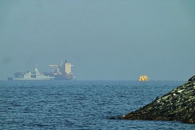 Iran creates new agency to control shipping in Strait of Hormuz while reviewing peace deal with US