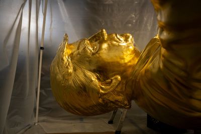 Towering golden statue of Trump unveiled at dedication ceremony