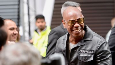 Dave Chappelle tells Michelle Obama the Trump era is so unbearable even his jokes can’t keep up