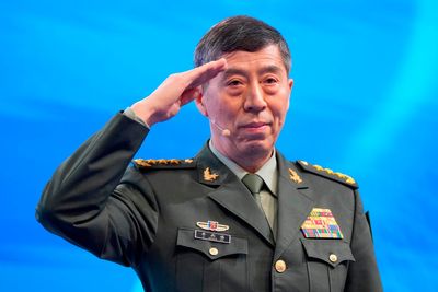 Two Chinese former ministers handed suspended death sentences in latest Xi purge