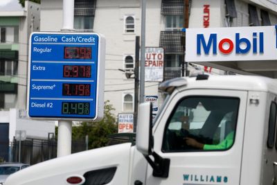 Trump claims doubled gas prices are ‘way down’ as his transport chief tells Americans to take road trips