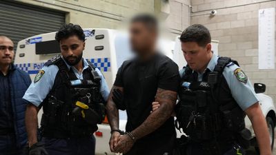 Alleged hit men charged over plot to kill crime boss