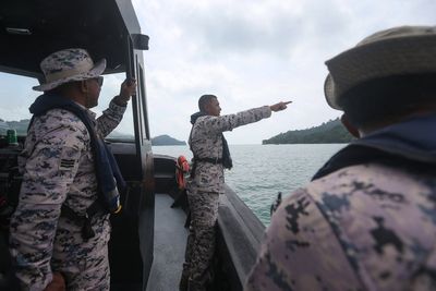 At least 14 missing after boat carrying Indonesian migrants capsizes off Malaysia