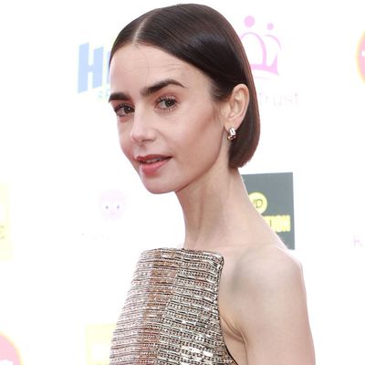 Lily Collins Styles a Carolina Herrera Gown in the Met Gala's Leading Color Trend