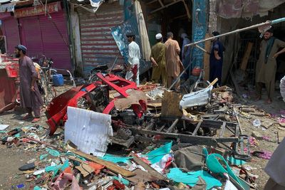 Bomb rigged to rickshaw explodes in Pakistan bazaar, killing 9 and wounding more than 2 dozen others