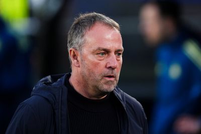 Barcelona boss Hansi Flick reacts to Lamine Yamal waving Palestinian flag at title parade