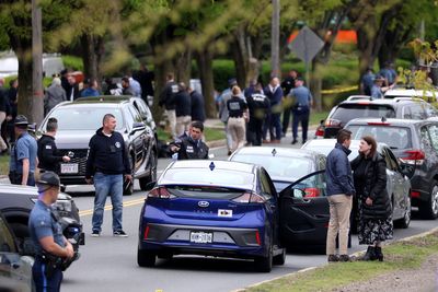 Man with an assault rifle sprays rounds at drivers near Boston, wounding 2 before being shot