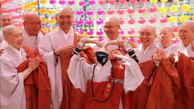 Chinese-born robot becomes world's first android monk as humanoid called Gabi takes vows in South Korea — three more $16,000 'spiritual cyborgs' will join it for Buddha’s birthday