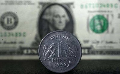 Rupee hits all-time low of 95.74 vs USD as outflows, oil risks weigh on outlook