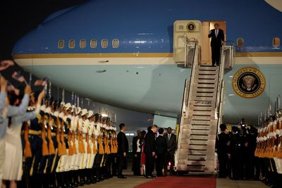 President Trump lands in China ahead of high-stakes meeting with President Xi
