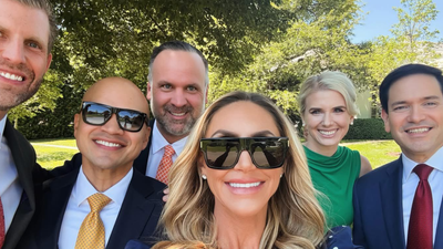 Trump Lands In China: Mystery Blonde Aide Joins President As Melania Stays Home