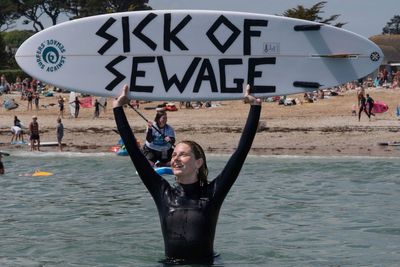 Thousands of surfers to stage ‘paddle out’ protest across UK over ‘broken’ water system