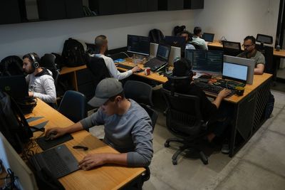 Bombs and bank restrictions: Gaza’s digital workers freelancing through blackouts